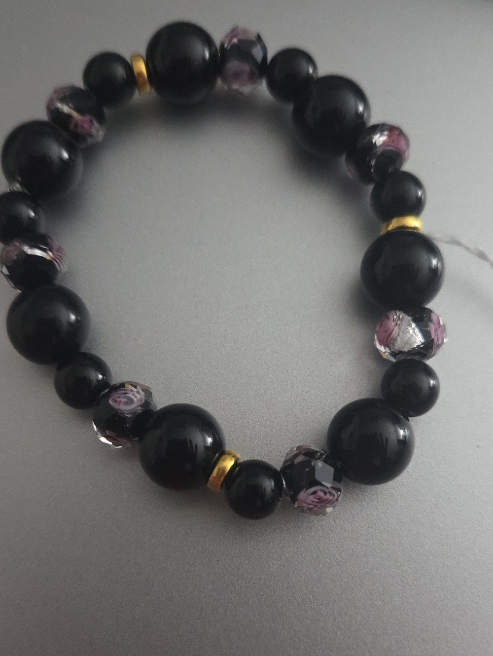Elegant Black Bead Bracelet with Pink Accent Beads